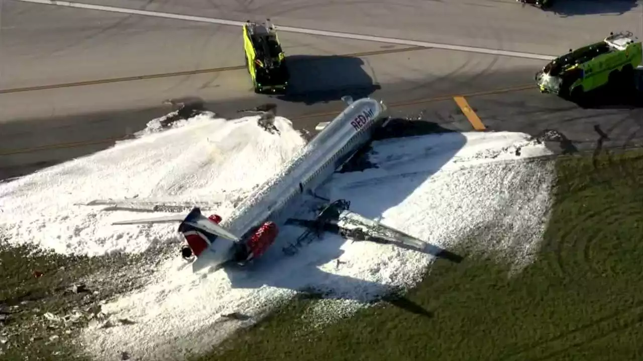 Red Air flight catches fire after landing gear collapses at Miami International Airport