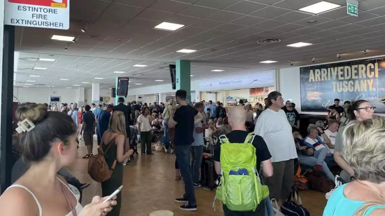 Brit holidaymakers ‘stranded in hot airport corridor with no food, water or toilets’