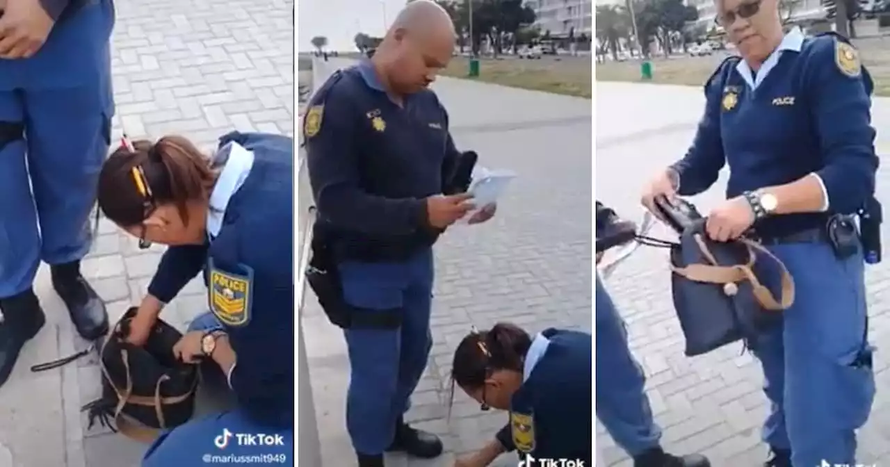 Mzansi discuss clip of SAPS searching woman’s bag, lady claims they stole cash