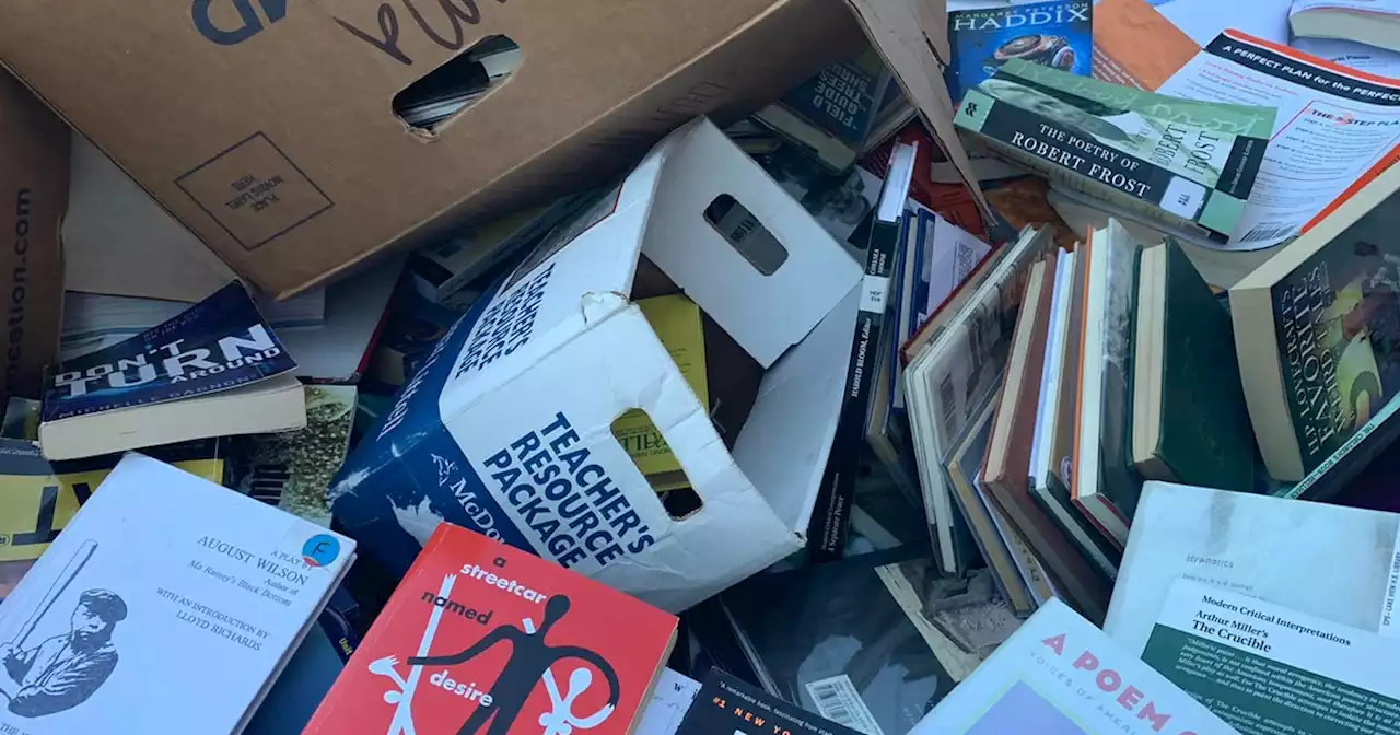 Hundreds of books found discarded in dumpster outside Lake View High School