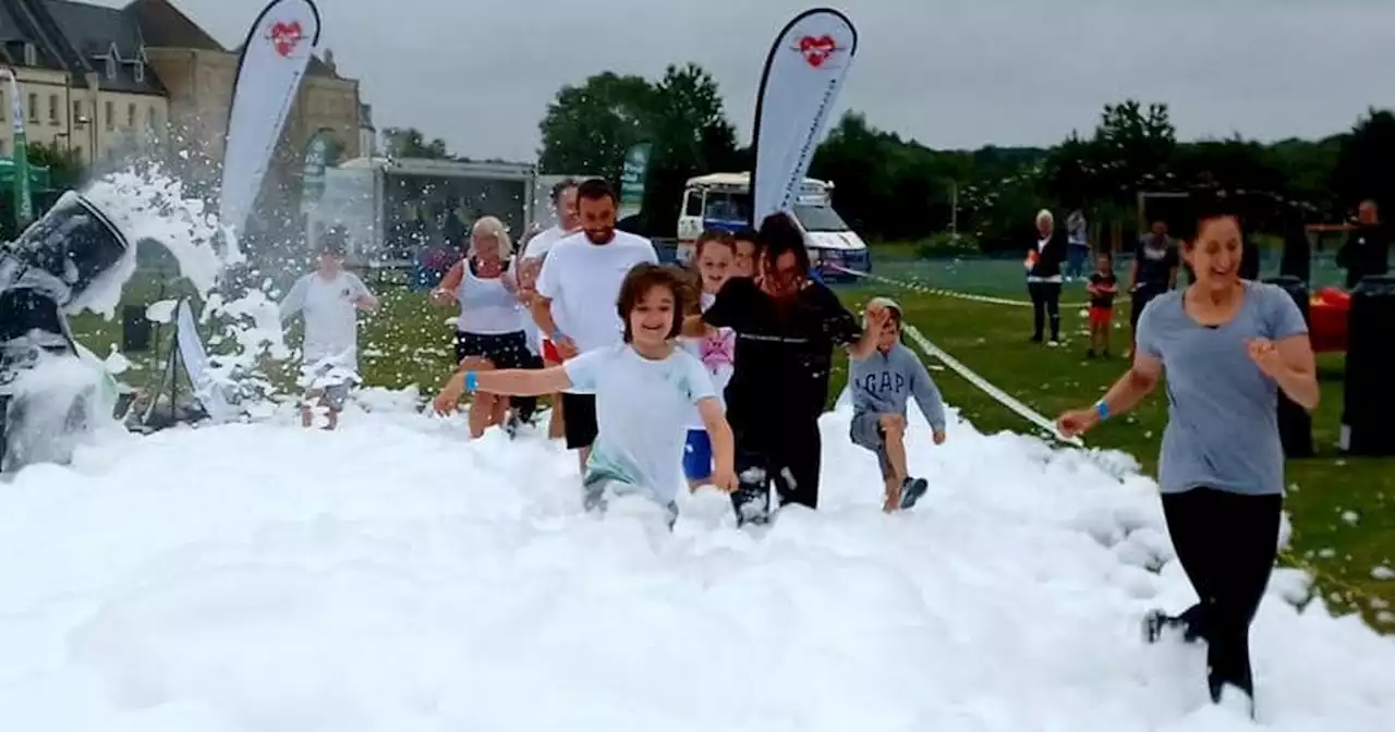 'Water Dash' with foam machines and slides raises hundreds