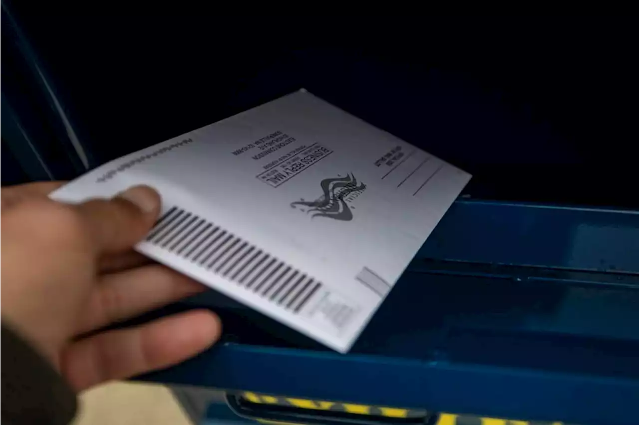 Gov. Baker signs bill ensuring mail-in ballots, early voting in Massachusetts