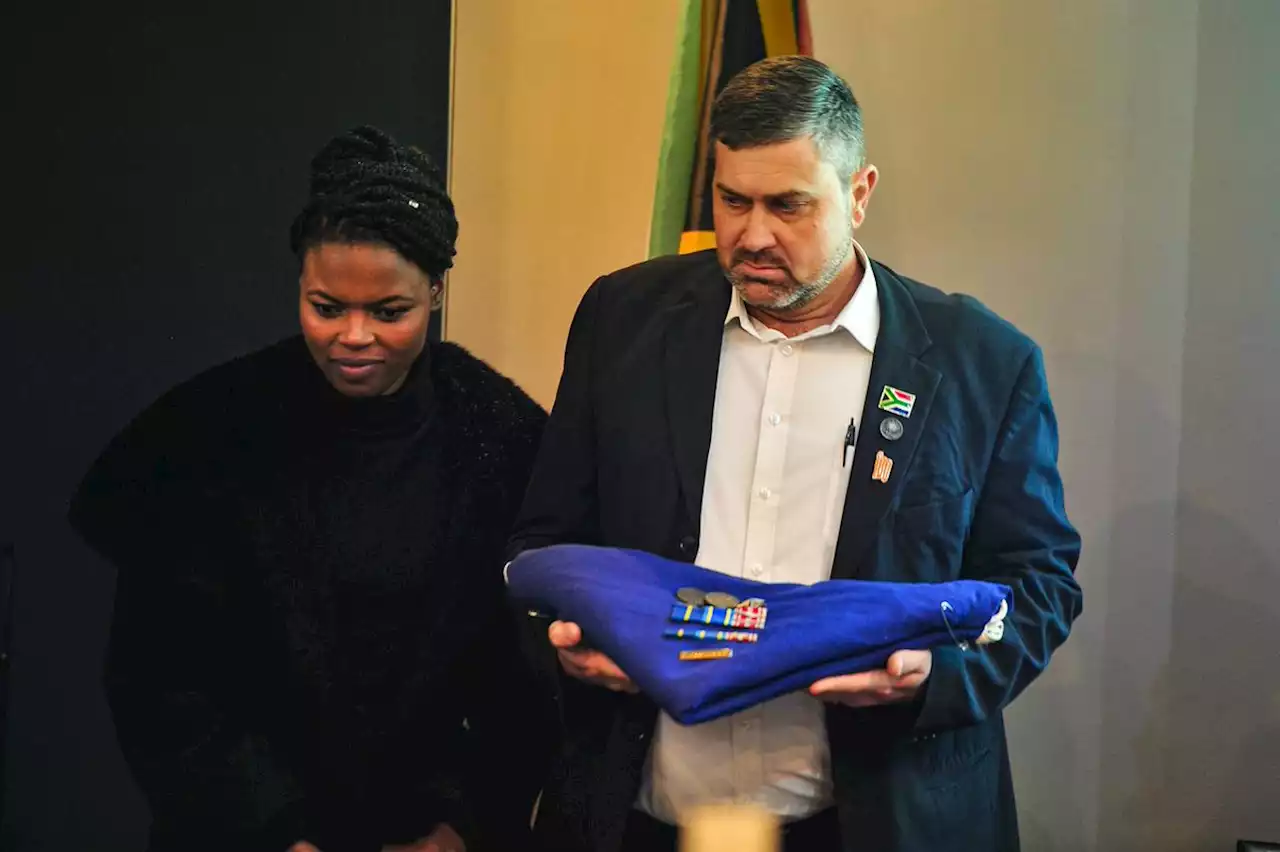 A couple donates apartheid flag that draped cop father’s coffin to Nelson Mandela Foundation | Citypress