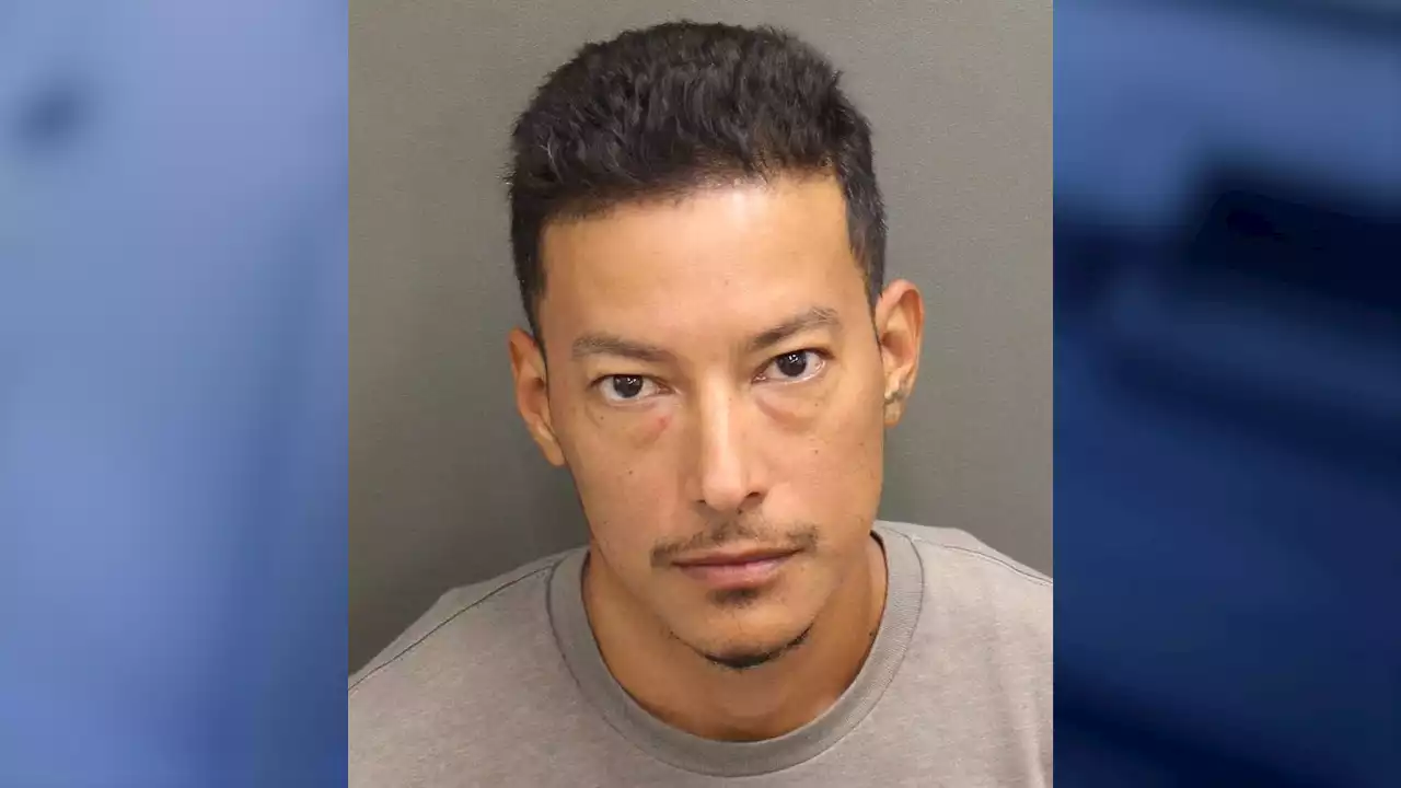 Man arrested at Disney Springs after being found with gun, knife, ammunition