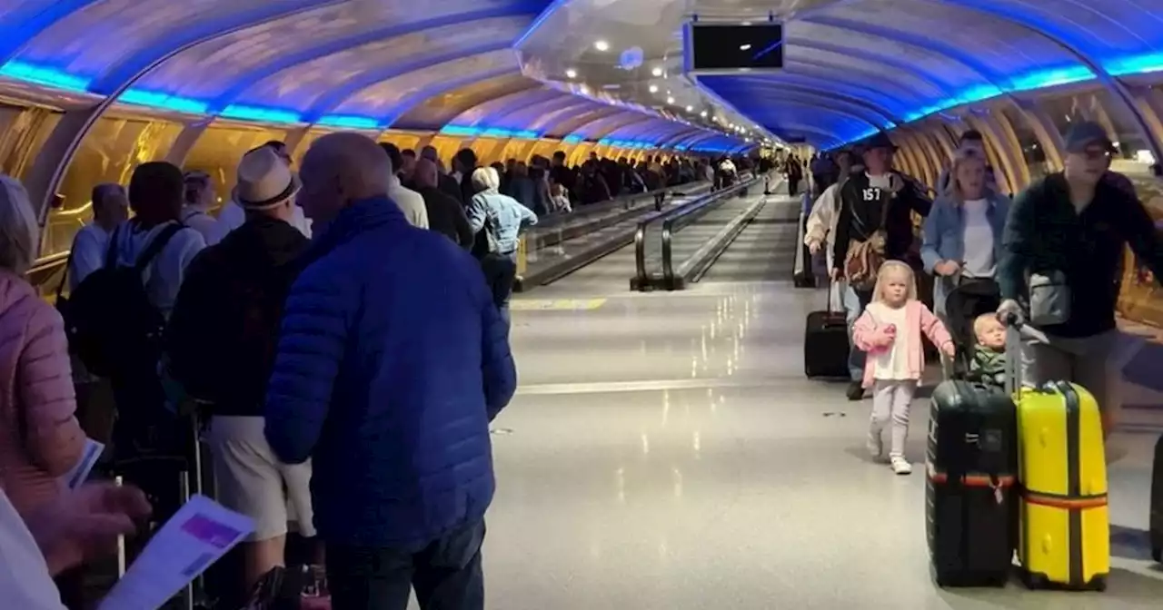 Passengers face travel chaos at Manchester Airport with huge queue