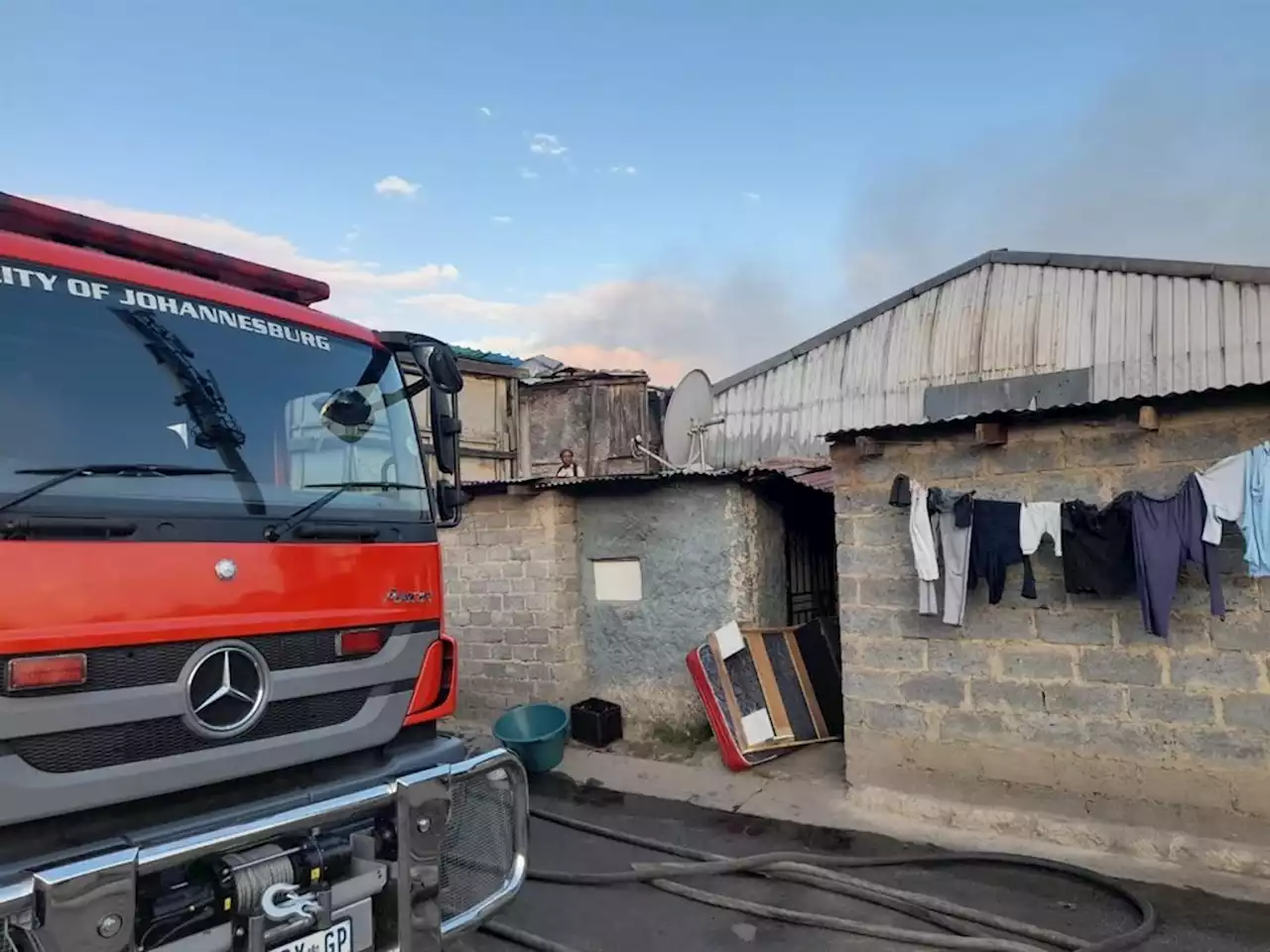 Despair as scores homeless after up to 200 shacks ravaged by fire inside old factory | News24