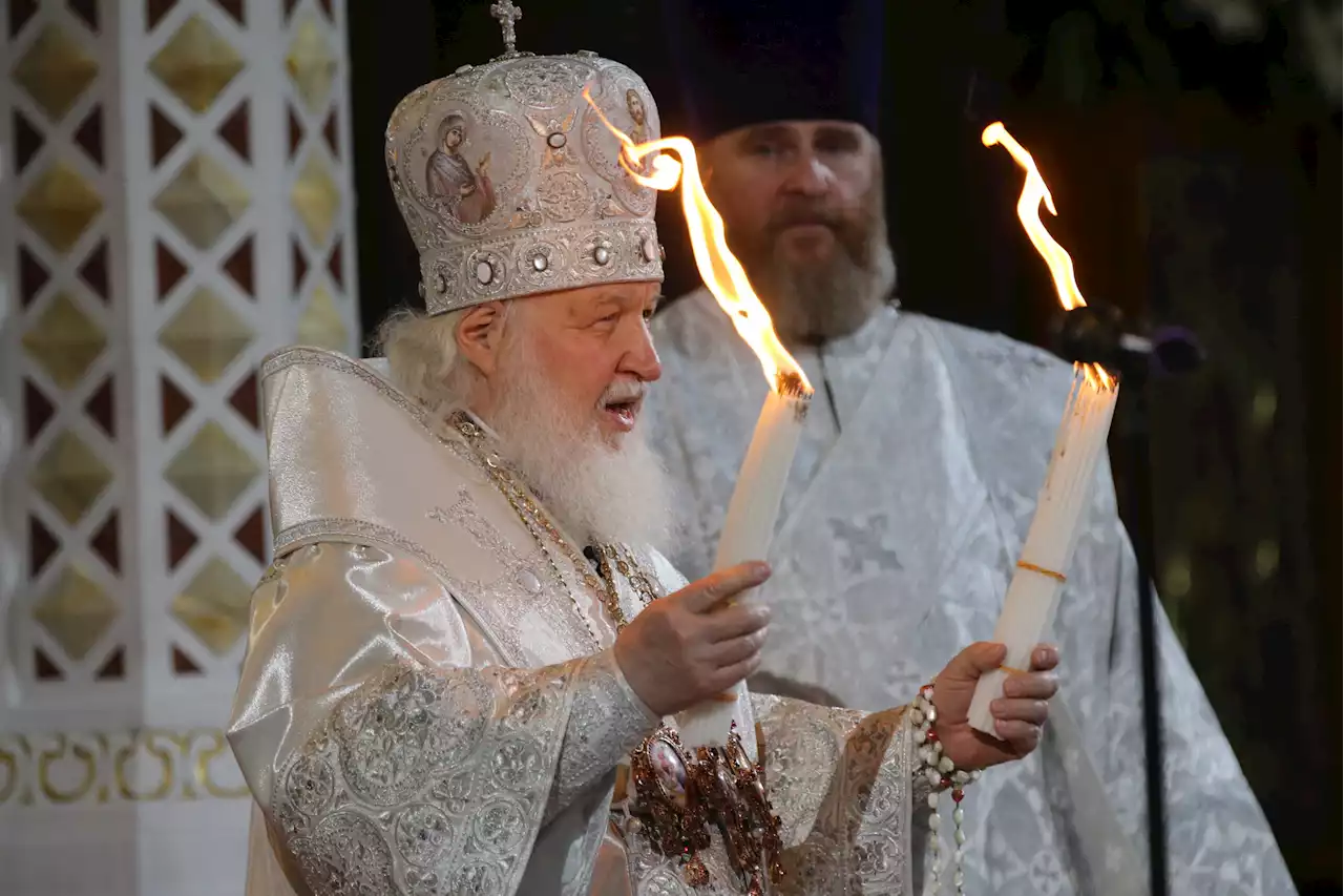 Putin's top priest collapses during Russian church ceremony