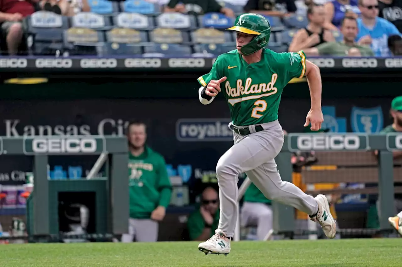 Athletics hang on for harrowing win over Royals