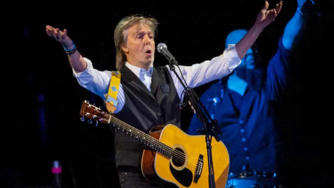 'Back together': Paul McCartney and John Lennon reunited at Glastonbury Festival