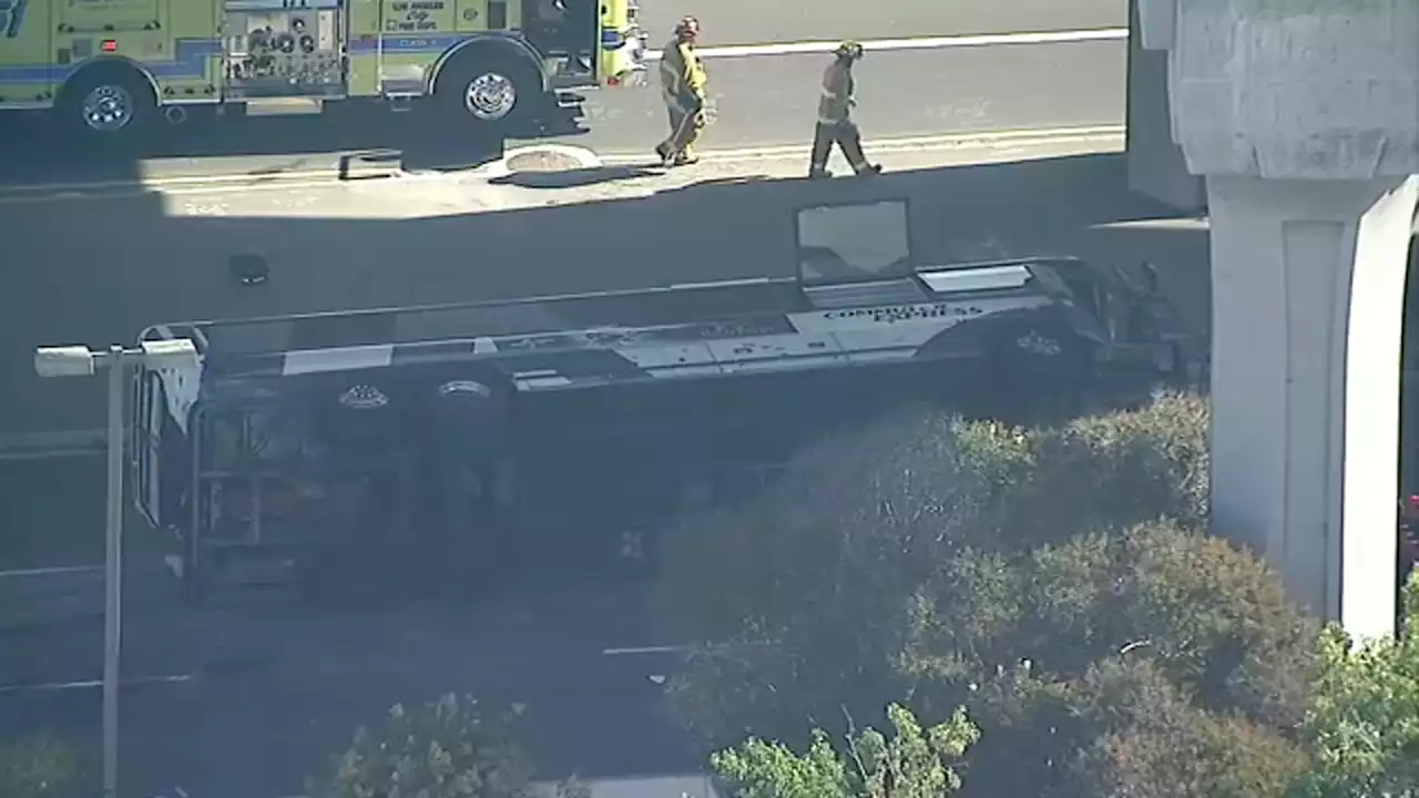 At least 10 people being treated after tour bus crash near LAX involving big rig