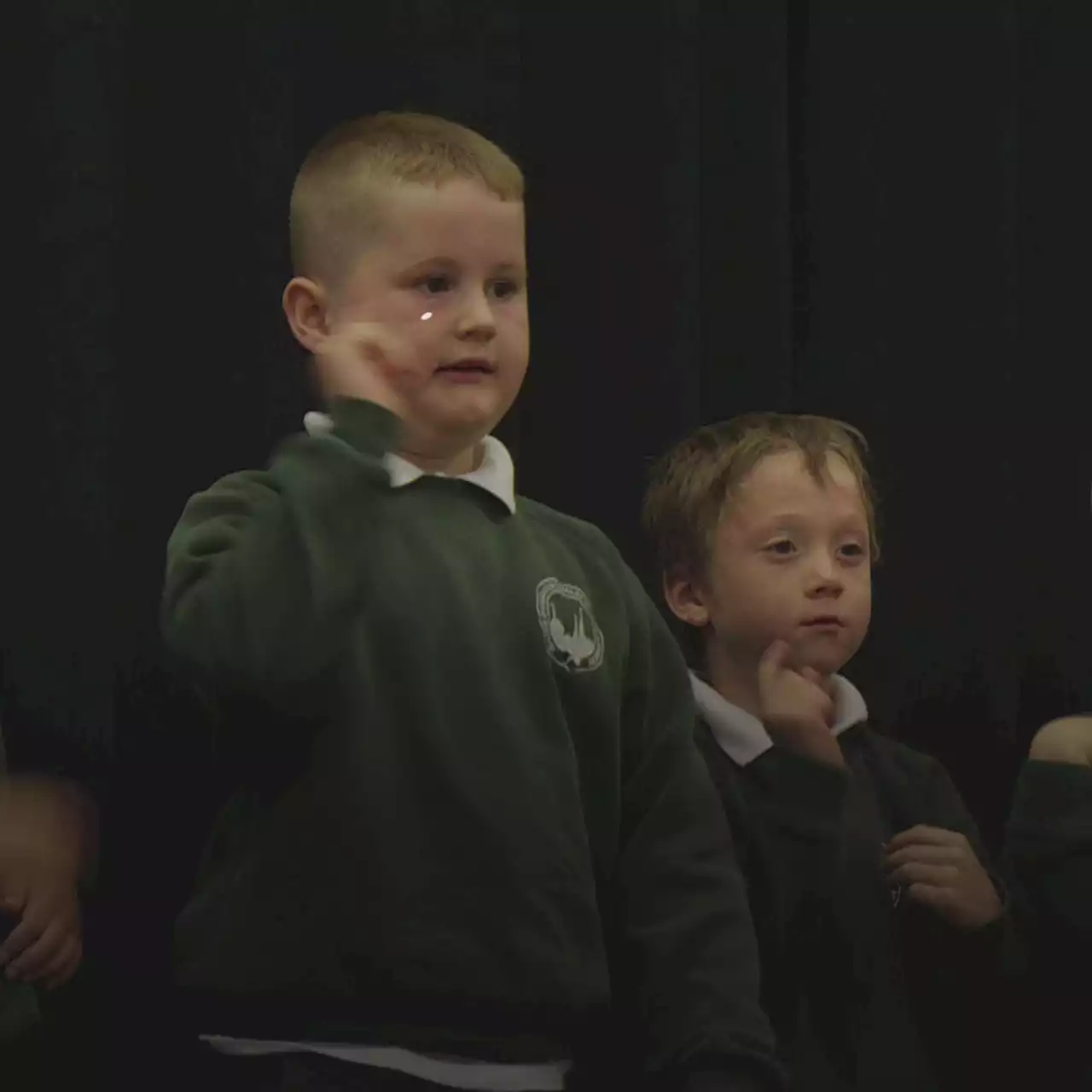 Children learn sign language to support classmate