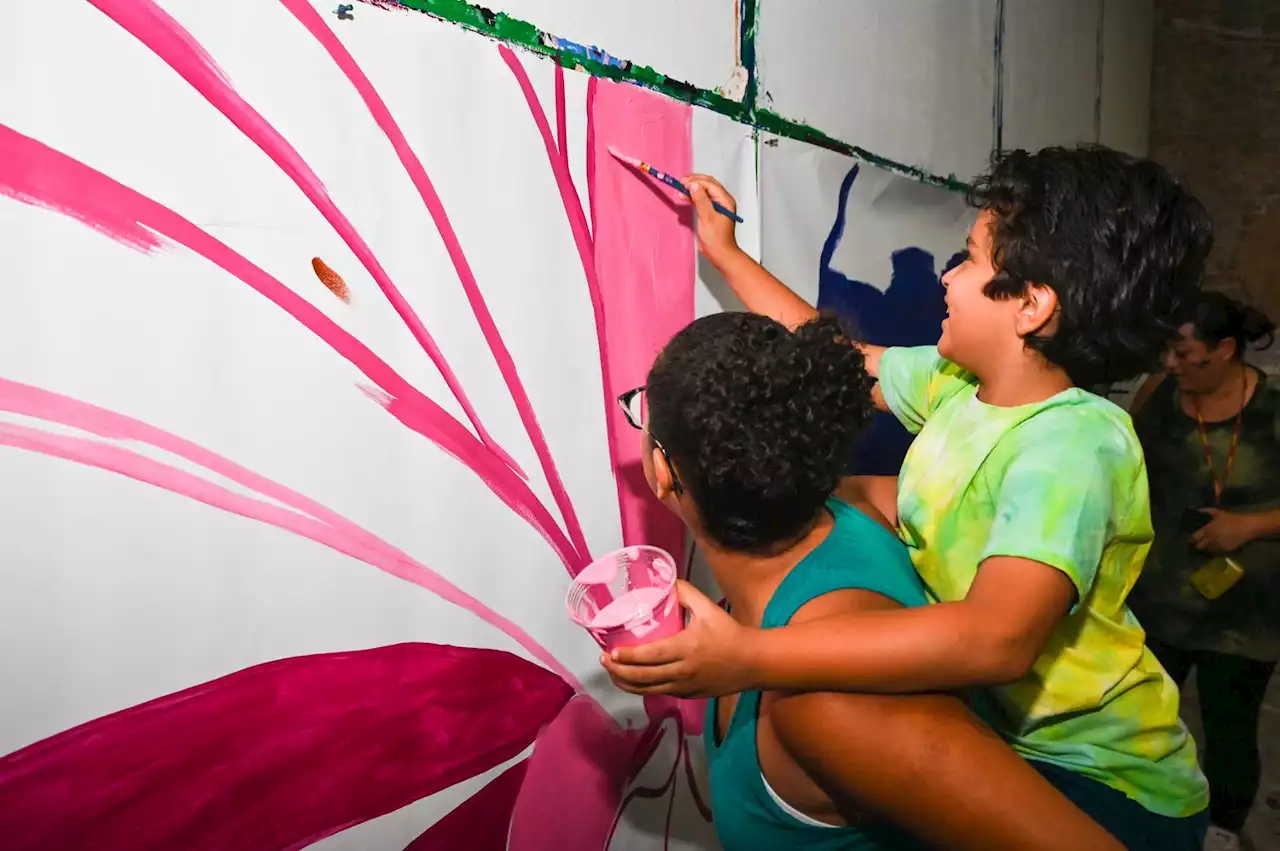 ‘It brings people together’: Mural in progress celebrates women, emphasizes community