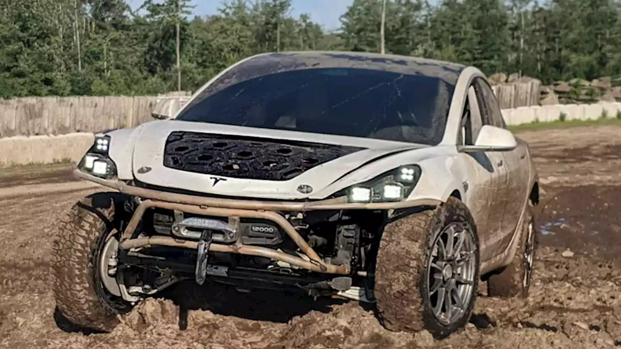 YouTubers Turn Wrecked Tesla Model 3 Into Off-Road Machine Fit for Mad Max