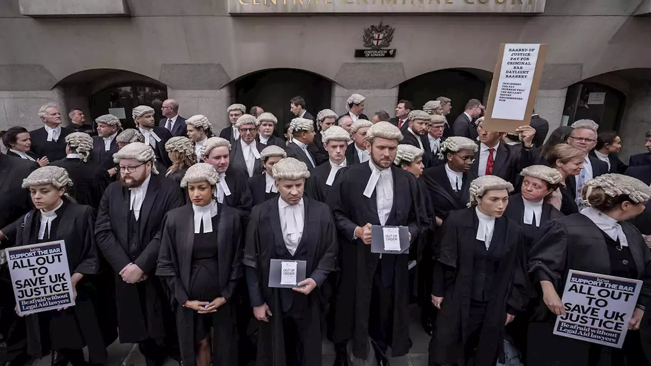 Barristers walk out of courts in strike over pay with over 1,000 cases affected each day