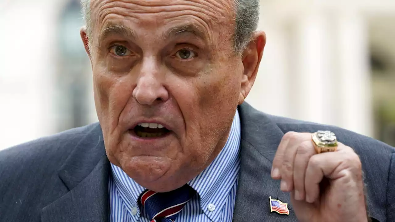 Man jailed, charged with assault after confronting Rudy Giuliani