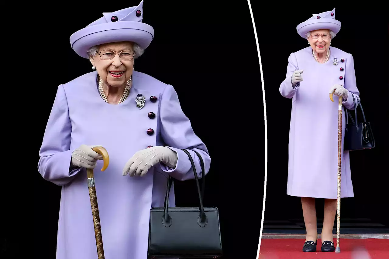 Queen Elizabeth sports eye-catching lavender outfit to honor Scotland