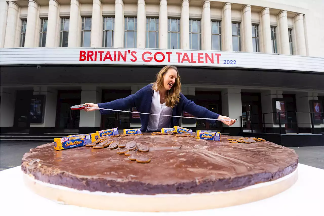 Former Bake Off champion unveils world’s largest Jaffa Cake