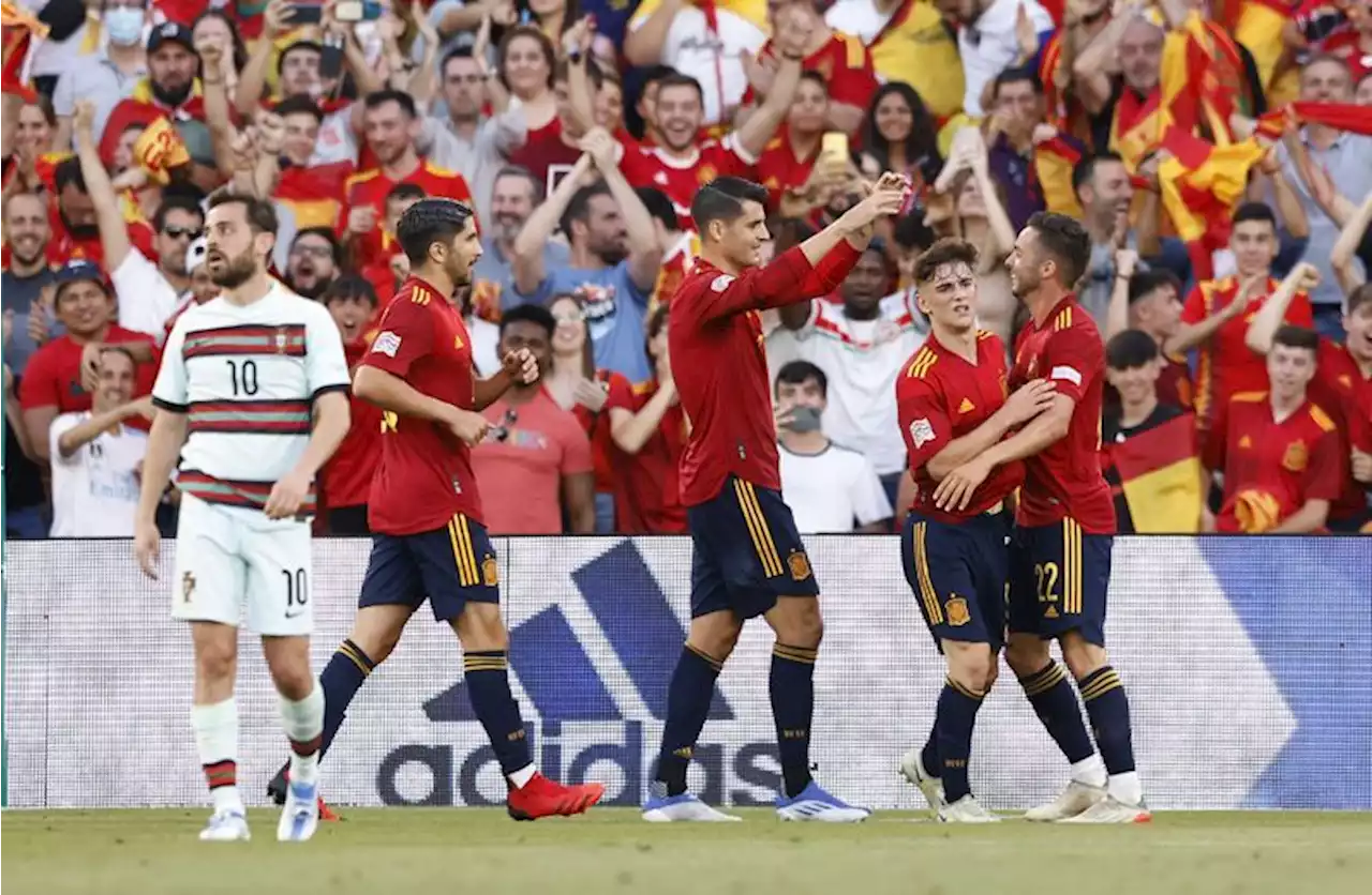 Soccer-Spain and Portugal share spoils in Nations League