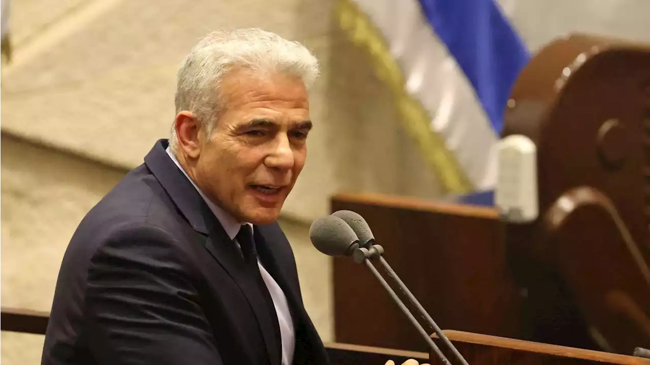 Israeli parliament dissolves, paving the way for Lapid to become acting prime minister