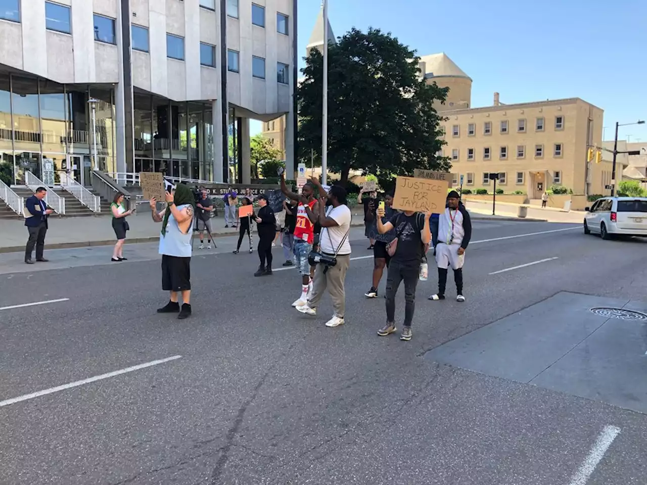 Protesters block road near Akron police station following recent deadly officer-involved shooting