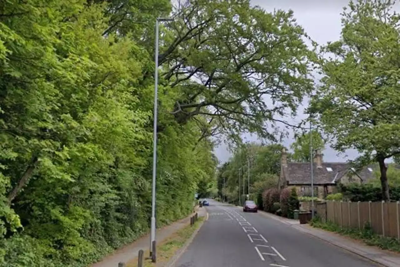 Police called out to Leeds street as two-vehicle crash leaves car on its roof