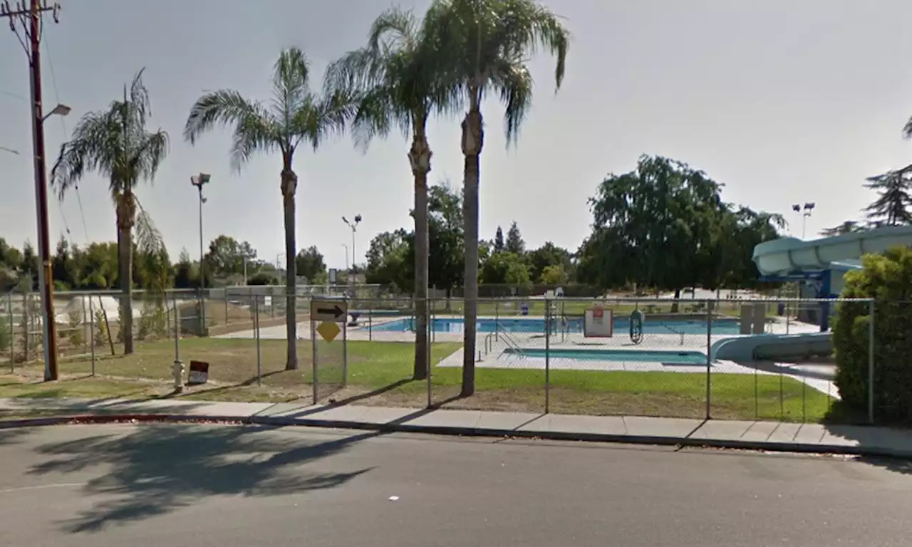 Car crashes into California pool where 20 people are swimming