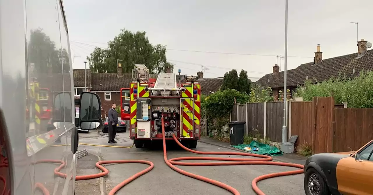 Fire forces houses to be evacuated as blaze threatens street