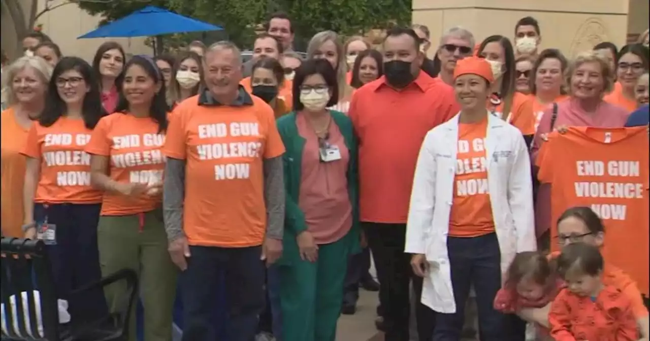 OC trauma surgeons and medical professionals wear orange to protest against gun violence