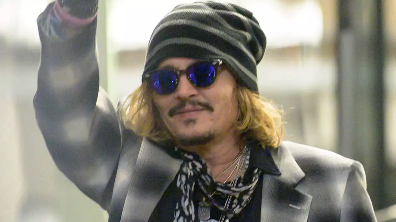 Johnny Depp gets rockstar reception at concert with crowds screaming 'Innocent!'