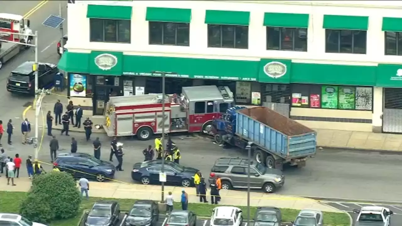 5 hurt, fire truck hits building in 3-vehicle crash in New Jersey