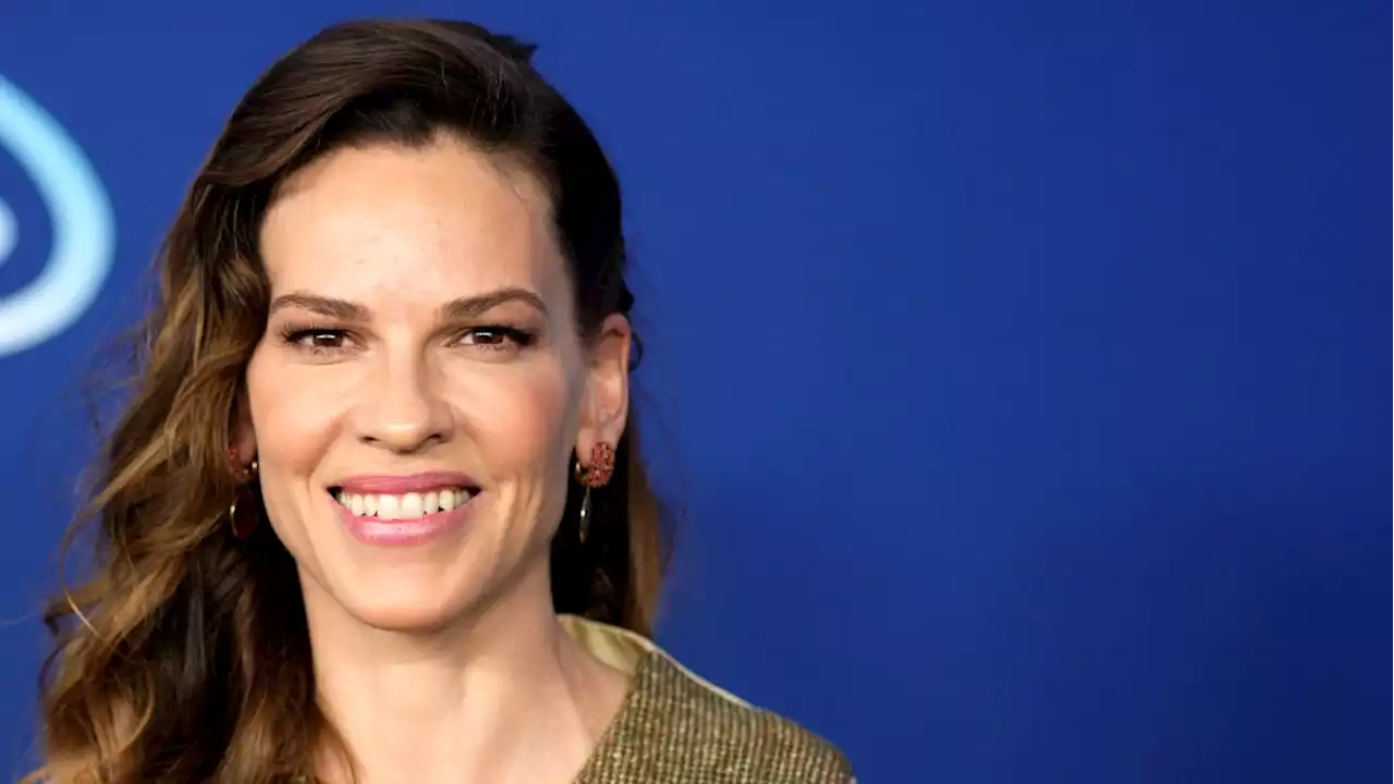 New York woman finds her lost dachshund -- in Hilary Swank's lap