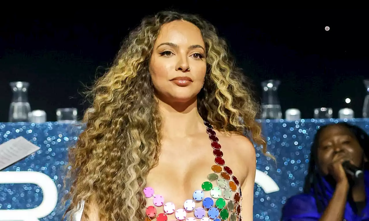 Little Mix's Jade Thirlwall shimmies in risqué rainbow-coloured mini dress