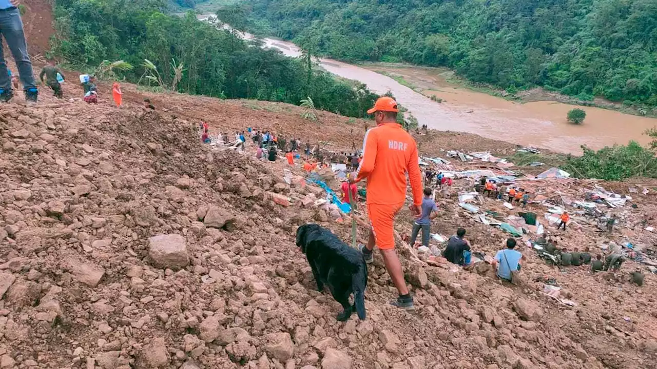 Landslide in India kills at least 14 and leaves 30 missing, as climate change-linked heavy rains continue