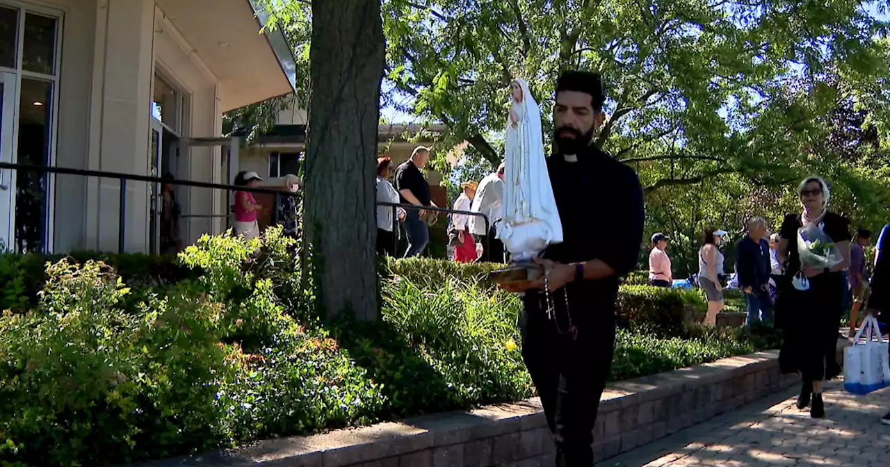 Church holds procession for prayer and healing in wake of Highland Park parade massacre