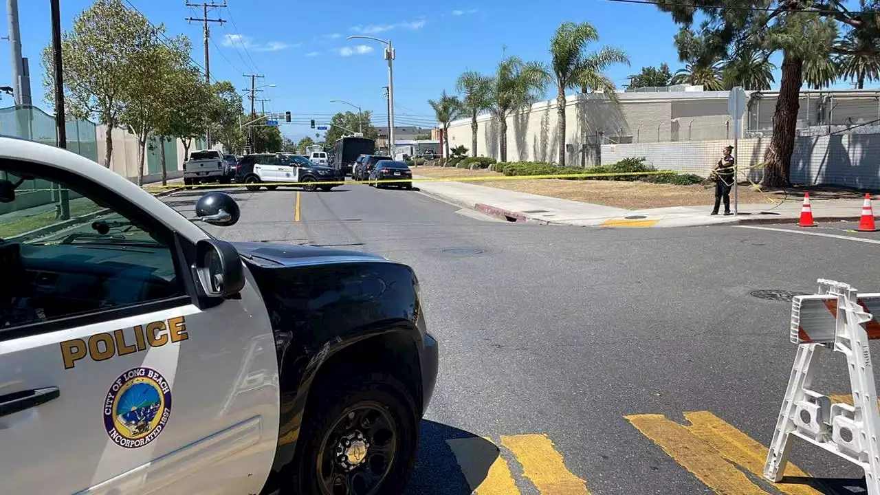 Man on roof armed with gun killed in shooting involving Long Beach police