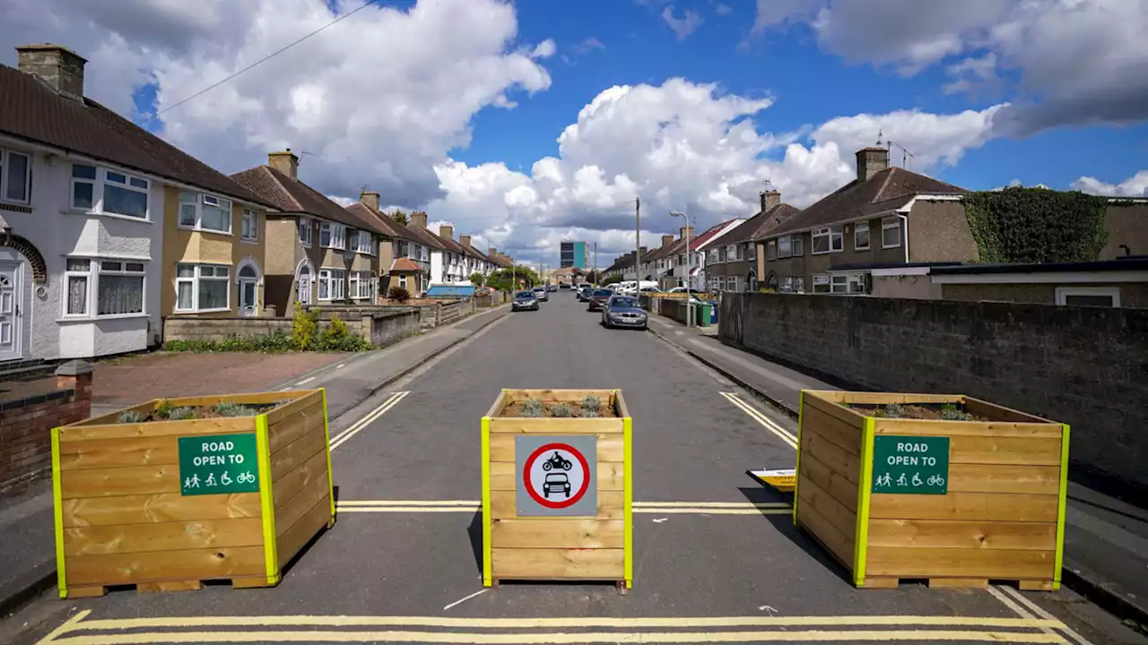 Council blasted for raking in up to £22MILLION in parking fines in a YEAR