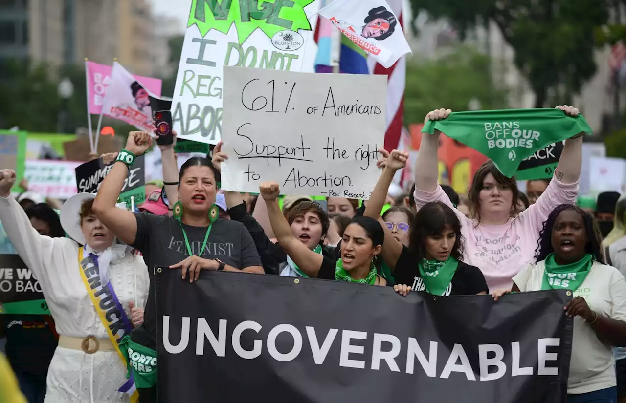 Hundreds march to White House, risking arrest to protest Roe’s reversal