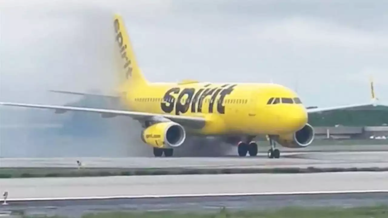 Spirit Airlines plane briefly catches fire on runway after landing