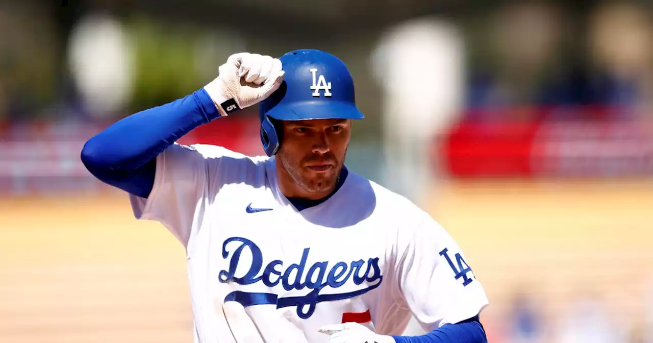 Freeman gets 4 hits, Dodgers roar back to sweep Cubs 11-9