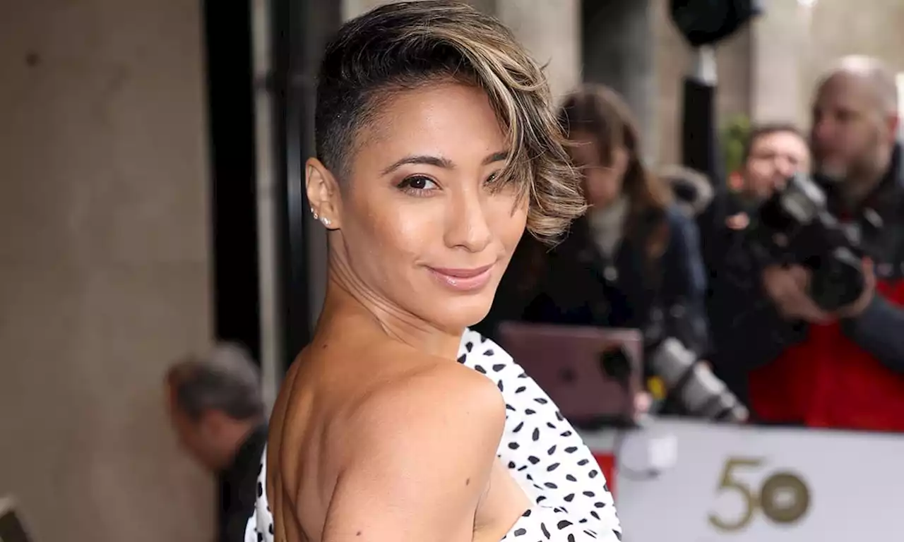 Strictly's Karen Hauer stuns in sheer backless bridal dress in intimate wedding photos