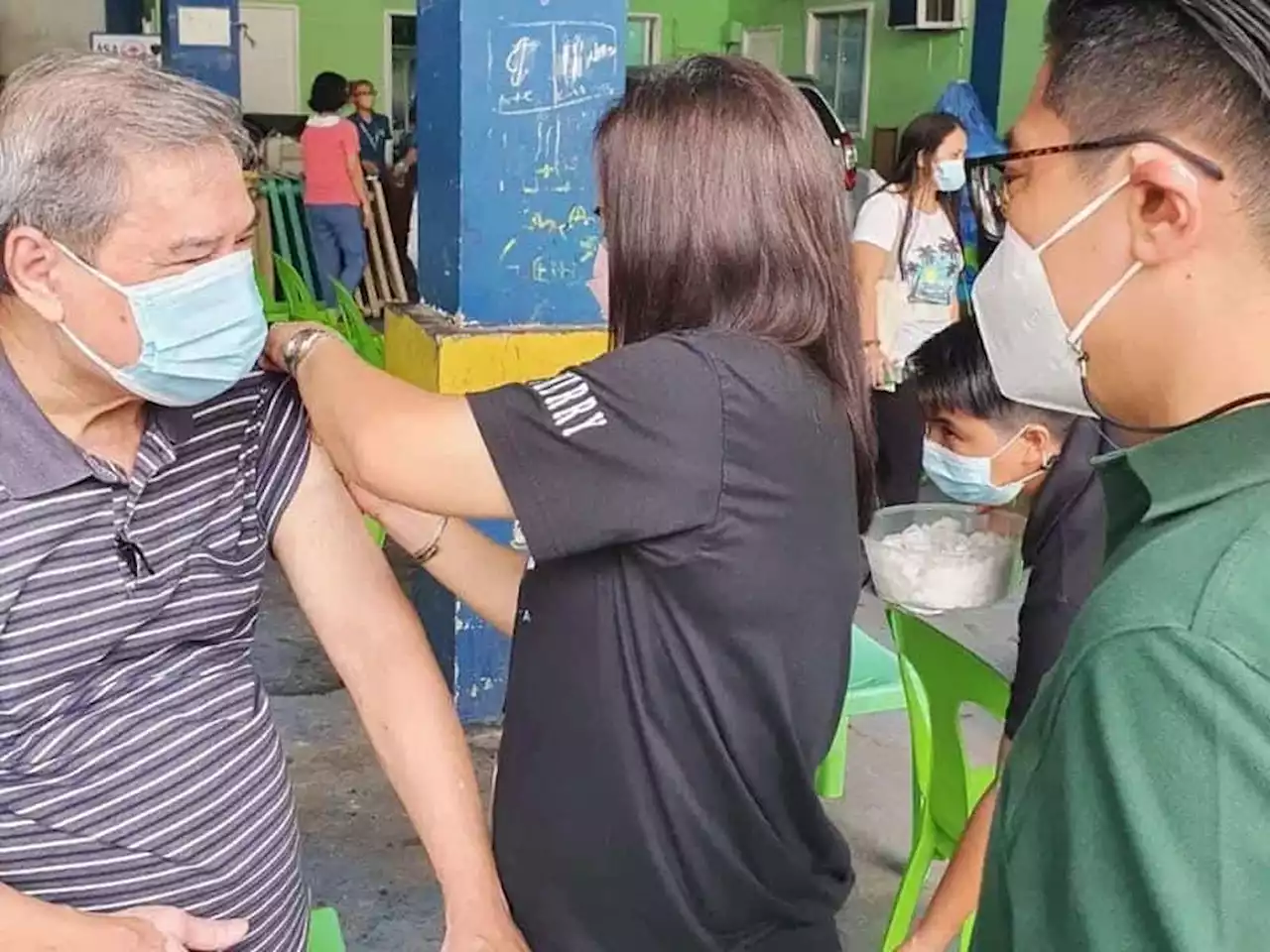 Pasig barangay senior citizens receive anti-flu jabs amid Covid-19 threat