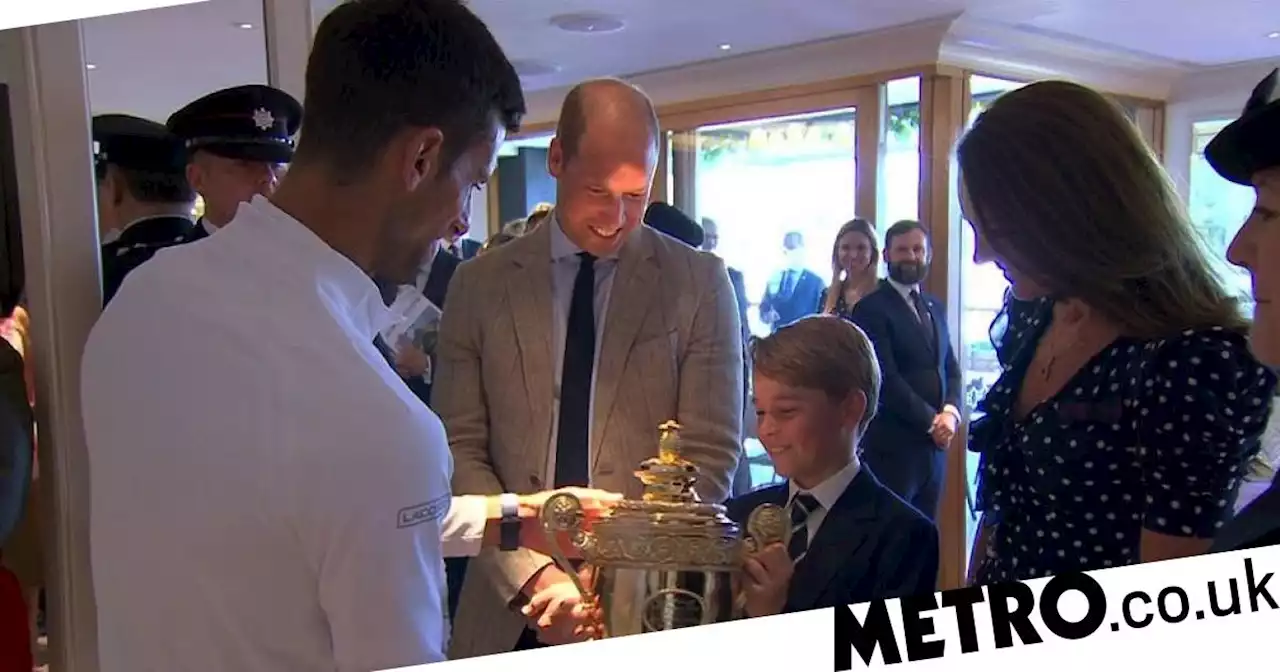 Prince George gets to hold Wimbledon trophy and says 'it's a bit heavy'