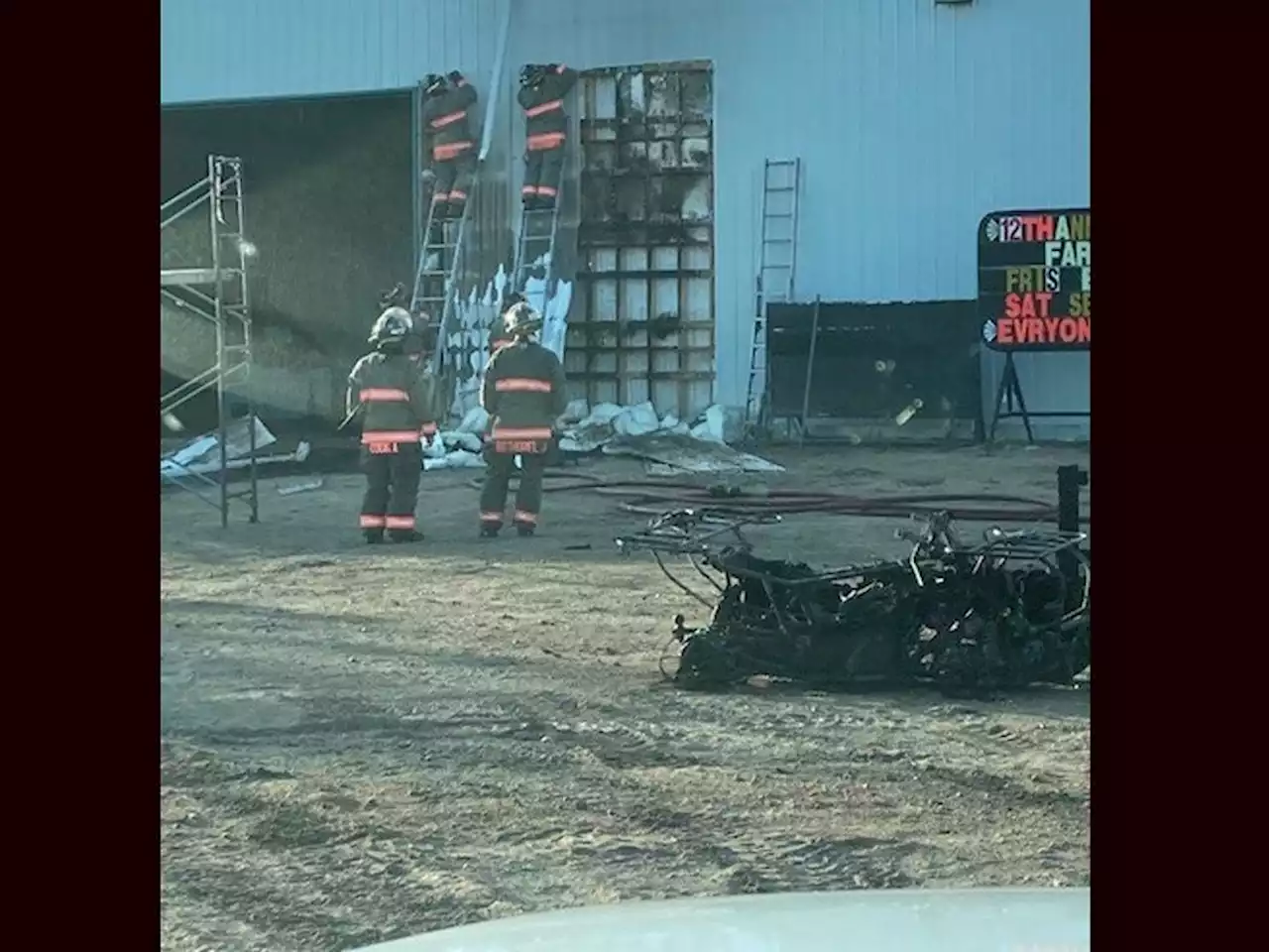 Shop employees rally to extinguish nearby RV fire