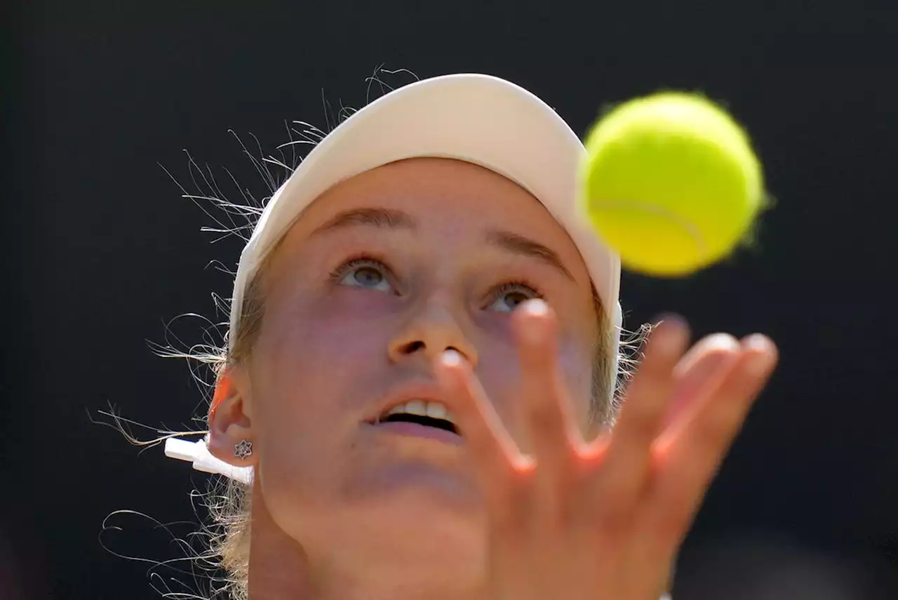 AP PHOTOS: Wimbledon ends with 1 new face, 1 familiar face