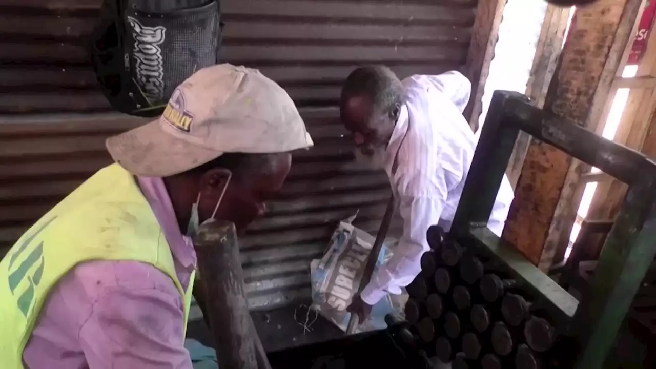 In Congo, elderly craft clean fuel pellets to keep active