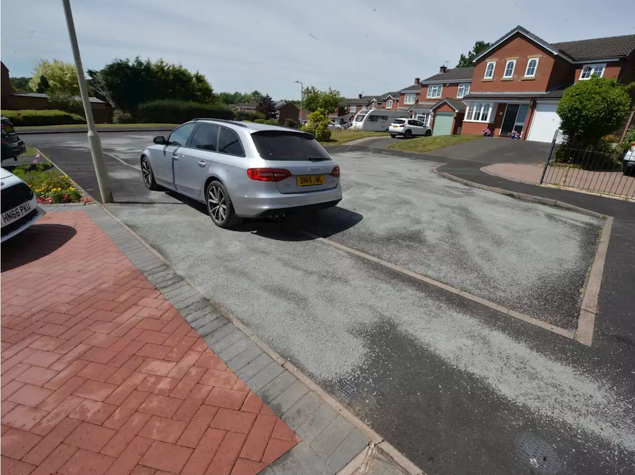 Council blames hot weather for melted asphalt as residents criticise 'botched' work