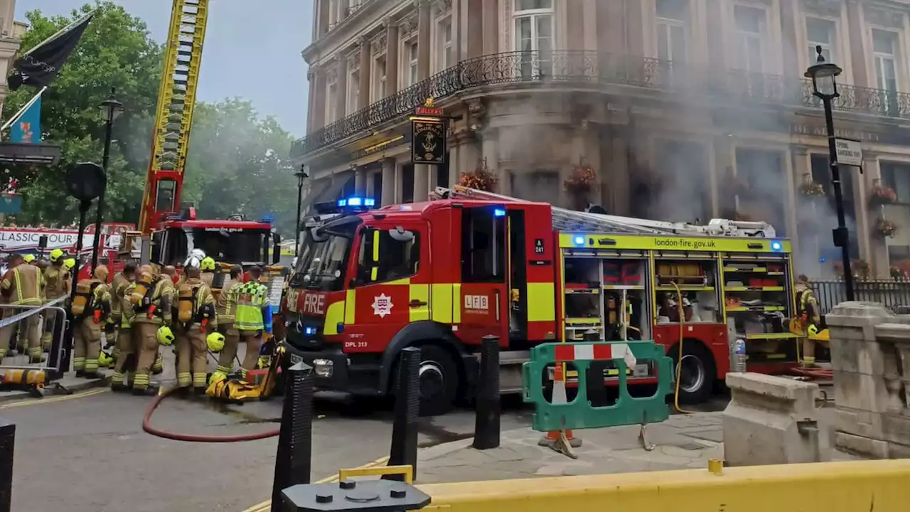 Huge plumes of smoke pour from Trafalgar Square pub as London firefighters tackle 'challenging' blaze