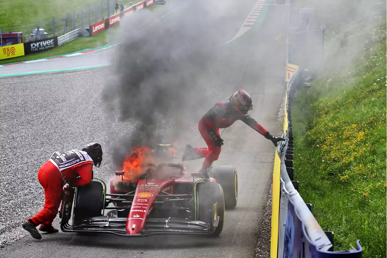 Sainz's Ferrari bursts into flames with driver STILL INSIDE at Austrian GP