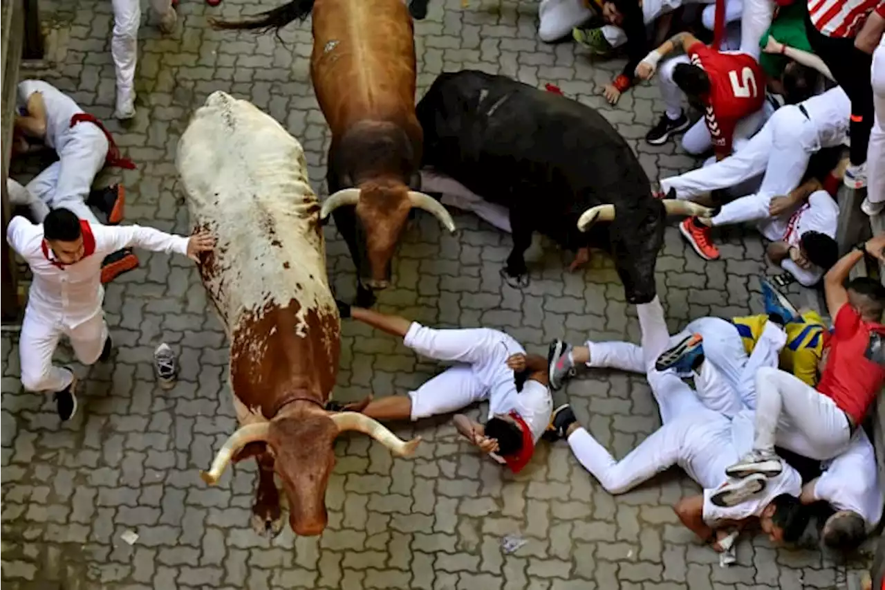 Spain's running of the bulls: 3 people gored at San Fermín