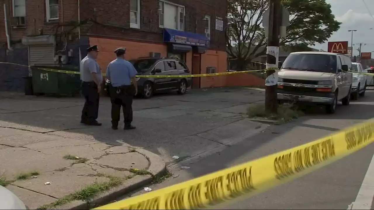 Man critically injured after two gunmen fire 45 shots outside Philadelphia store